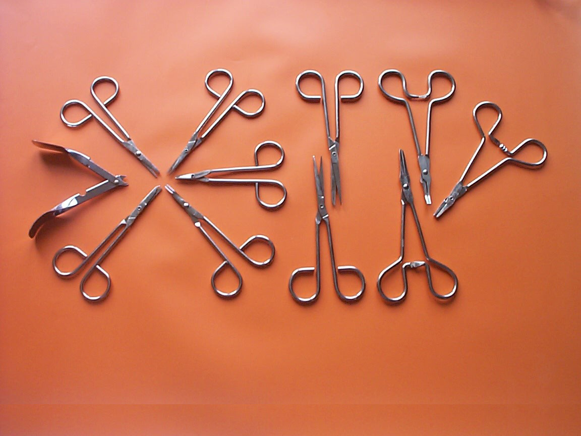 STEEL WIRE SCISSORS ( HEMOSTAT & STAPLE REMOVER )